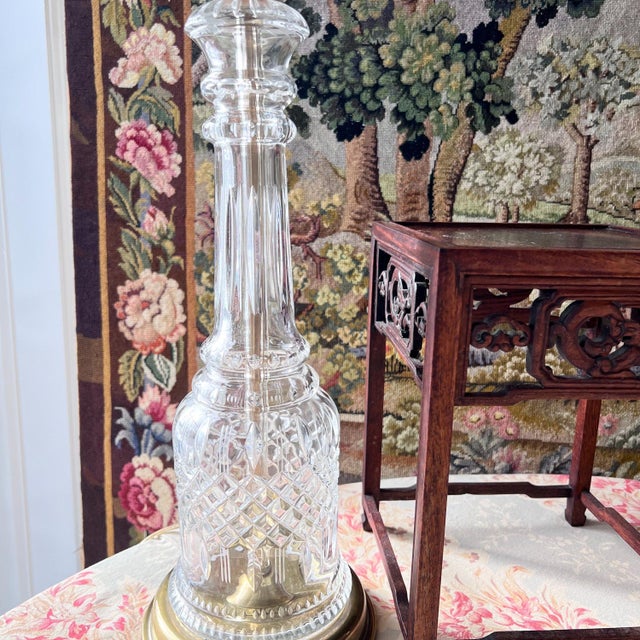 This lamps is AMAZING and such a beautiful statement piece! Made of glimmering cut crystal on a brass base, this gorgeous...