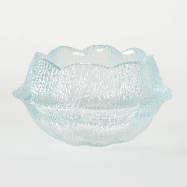 A glass bowl manufactured in the 1980s by the renowned Danish manufacturer Holmegaard. Designed by Sidse Werner. An...