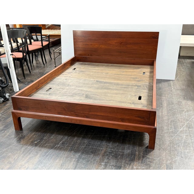 Design Plus Gallery presents a Queen Size Ming Bed Frame. This platform bed is made of solid walnut with a deep walnut...