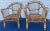 A stylish and inviting pair of vintage rattan barrel lounge chairs, showcasing a classic coastal silhouette with warm...