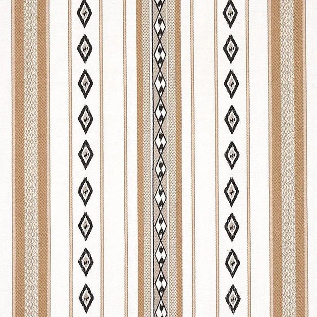 This medium-scale woven Cotton stripe recalls wide open skies and desert vistas. A combination of weaving and embroidery...