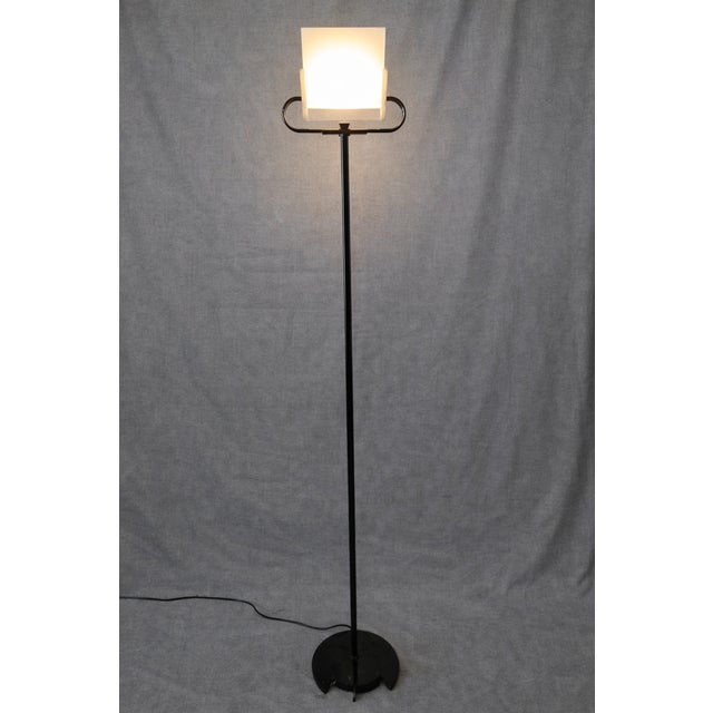 About This Piece This exquisite 'Triana' floor lamp is a definitive icon of 1980s Italian postmodernism. Designed by the...