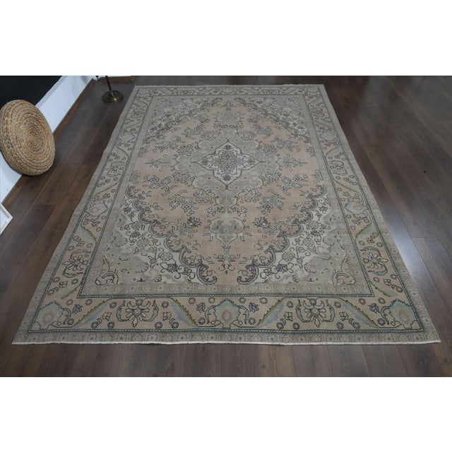 Vintage Persian Hand-Knotted area rug is a semi-antique vintage area rug. The '70s Eastern region of Anatolian's unique...