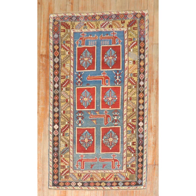 A late 19th century woven antique Karaghasli Caucasian rug. 3' x 5' The brilliant colors and use of lateral elements make...