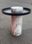 This very unusual and artistic accent table has a deco style to it. It is black metal and solid Carrera marble. Could be...
