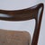 Exquisitely crafted in Italy, this rare set of 8 walnut dining chairs—including 2 armchairs—is attributed to mid-century...