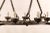 French Mid-Century Eight-Light Forged Iron Chandelier With Hooks and Scrolls For Sale In Atlanta - Image 6 of 9