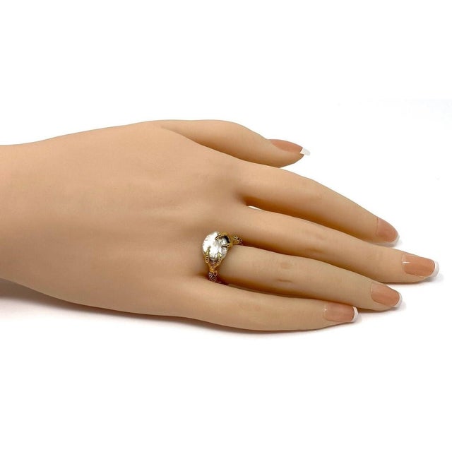 This authentic Carrera y Carrera diamond and pearl ring is an elegant example of the Spanish designers sculptural...