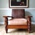 This beautiful lounge chair by Ralph Lauren is a rare find. It is in the style of safari with gorgeous leaf carvings on...
