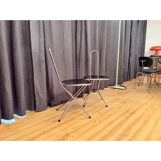 A pair of folding chairs designed by Niels Gammelgaard for IKEA from the 1980s. In good original condition. Designed by...