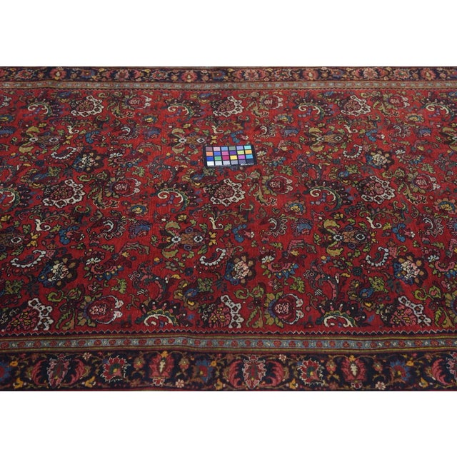 This virtually indestructible, board-like Kurdish city scatter from NW Persia, shows a saturated tomato red field with a...