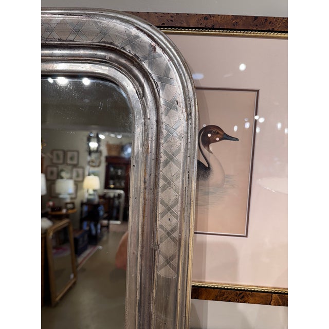 This is a gorgeous 19th century Louis Philippe Mirror! There is hand carved detail on the edges of the mirror in a simple...