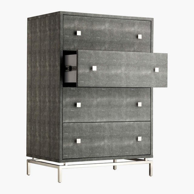 A true showpiece for the discerning eye. This CB2 Faux Shagreen Embossed Tall Chest is boudoir-level luxury distilled into...
