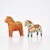 Two Dalar horses from around 1880. One is a so-called "Blåboning" (blue horse). These wooden collectibles are worn and...
