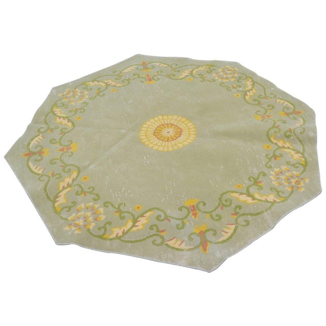 Hand-knotted with care using traditional rug-making techniques, this wool rug blends timeless craftsmanship with a modern...