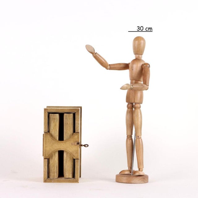 Memory box covered in parchment with gold decorated edges. Trademark present on the three elements. Working lock and...