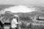 Black and white Print by Erich Andres, ca 1960. Niagara Falls, Canada, 1960s, daytime view of a tourist observing the...