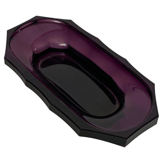This is an Art Deco style ashtray in glass, with purple color transparencies. It was made in art glass works in France in...