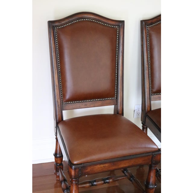 Two Gorgeous Wynterhall Leather dining chairs made in the USA by HOOKER Furniture. Extremely high quality original leather...