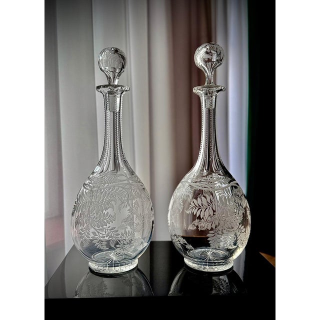 A near pair of late 19th century English decanters from the Stourbridge region, known for its high-quality glass...