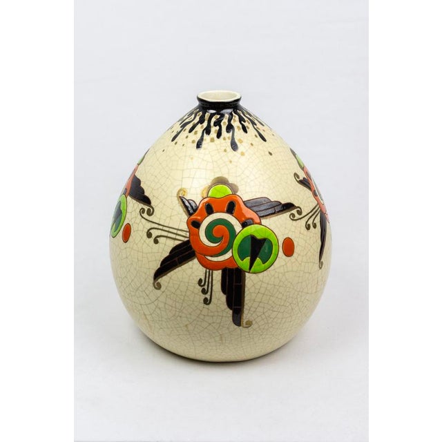 French art deco vase made around 1930 by the orchies factory in northern france, model 900. The decoration is documented...