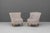 Pair of 1950s Swedish cocktail chairs with beech legs and newly upholstered in a pale pearly-grey velvet.