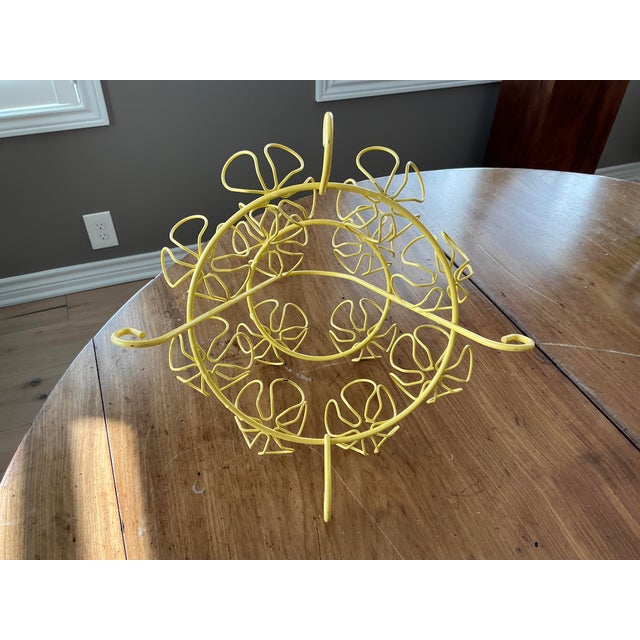 Fun bright yellow powder coated dessert (or other) caddy -- vintage piece with floral motif. Would be adorable holding...