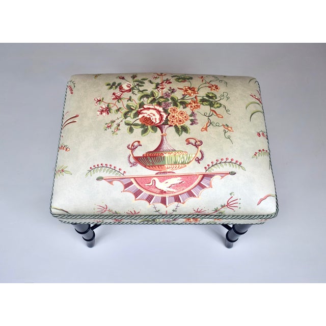 A Faux bamboo bench or ottoman with slightly splayed legs and X stretcher. An opulent, exotic mix of Chinoiserie and...