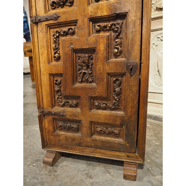 Unusual Circa 1650 Solid Walnut Carved Single Door Cabinet From Spain For Sale - Image 12 of 18