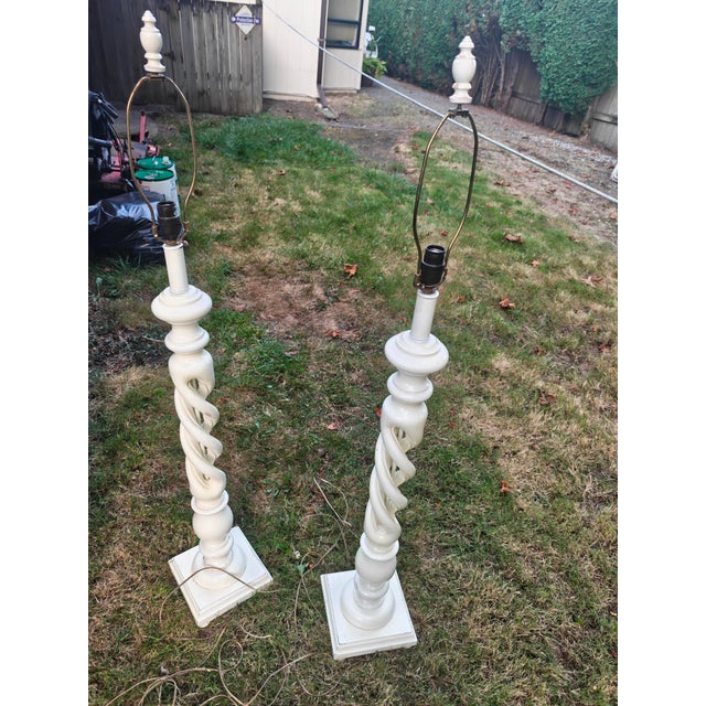 Pair of Mid-century barley open twist floor lamps with lamp shades included. Made from Carved solid wood and painted in a...