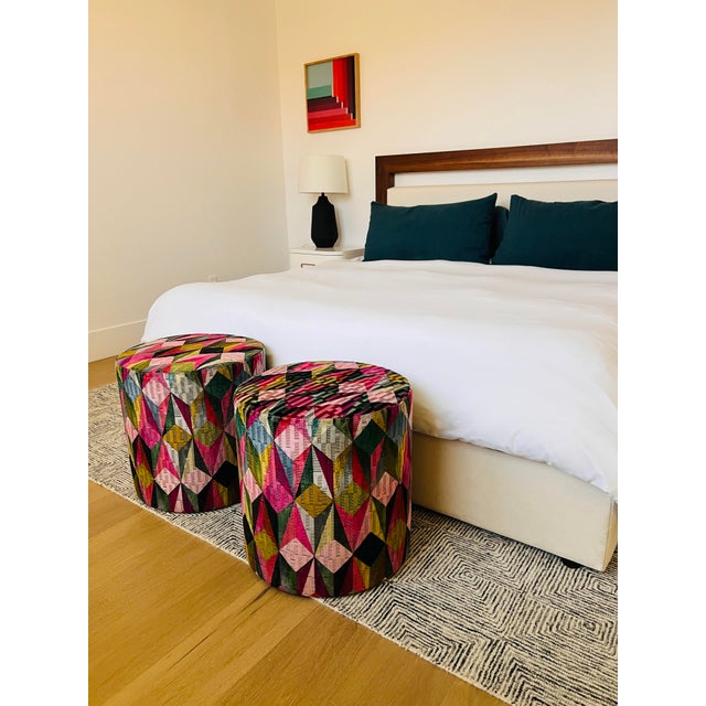 A striking set of three custom upholstered ottomans handcrafted by Pacific Seasons (Scottsdale, AZ) using the richly...