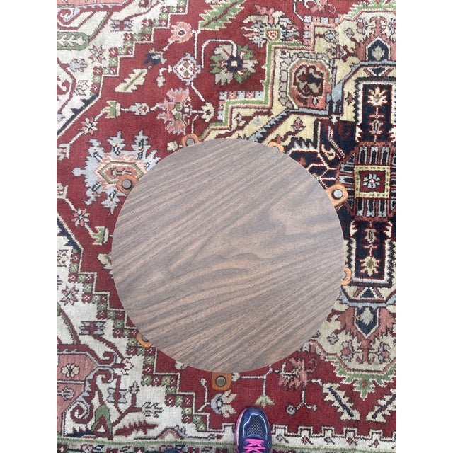 Mcm stacking tables. Set of three. Wood veneer top with solid wood legs. Each table is a walnut colored round table top...