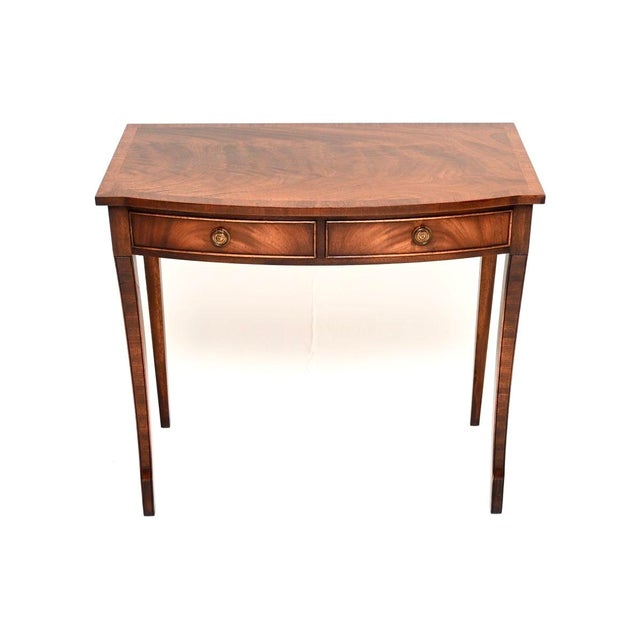 An elegant and very well made antique Regency style console table / desk. This was made in England, it dates from around...