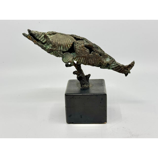 A beautifully detailed bronze of a whale on a marble base by the talented, noted American Sculptor Frank Eliscu. The...