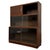 A handsome 20th-century English glazed cabinet by Minty Ltd, finely crafted from oak and distinguished by its unusual...