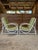 A charming pair of vintage bent rattan lounge chairs, estimated to date to the mid-20th century, featuring a classic...