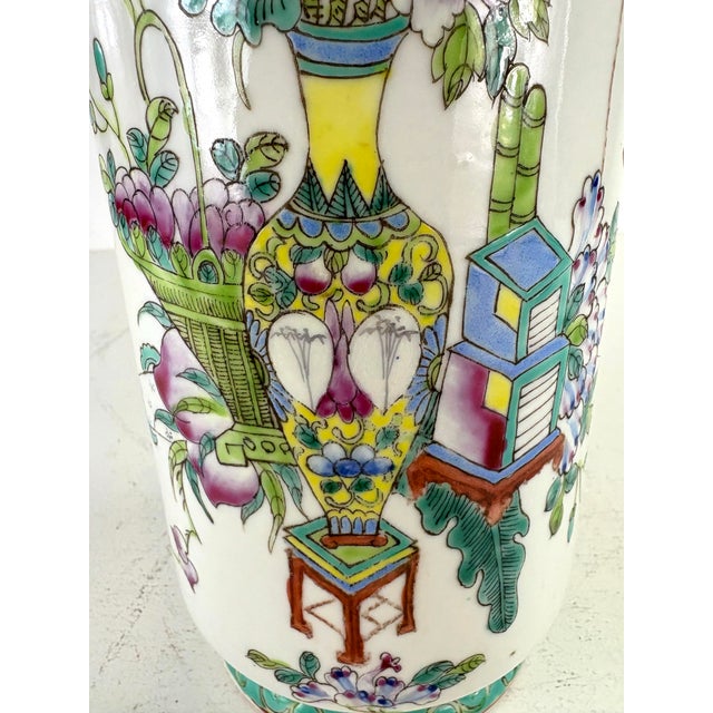 This is a mid-century vintage Chinese export handpainted vase. This beautiful porcelain vase has hand painted floral...