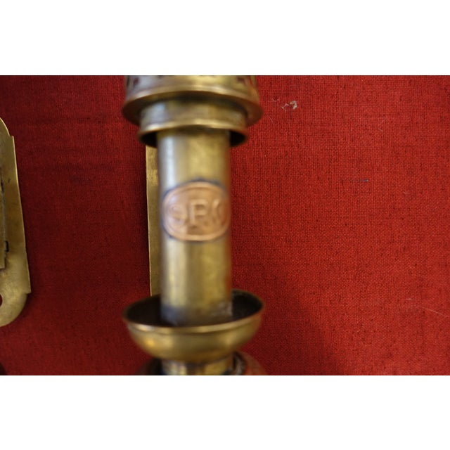 19th-century brass and copper wall lights. These three wall lights were used on trains (long before the creation of the...
