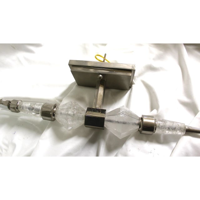 A modern Deco design Sconces with Hi-grade Rock Crystal Diamond shaped Crystal Stone and tapered cone blocks. Metal work...