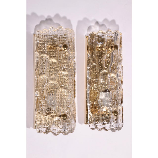 This exquisite set of two Swedish wall lamps was designed by renowned designer Carl Fagerlund for the prestigious Orrefors...