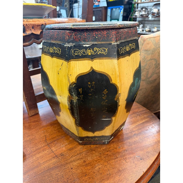 A 19th-century Chinese export tea canister, beautifully hand-crafted from wood during the Qing Dynasty era. This striking...