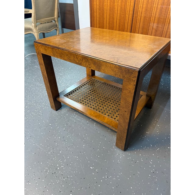 Awesome John Widdicomb Mid-century modern end table with burlwood and a cane bottom shelf.
