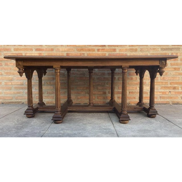 Spanish church table or altar from the 19th century with wooden columns and top with a fine line of hand-carved marquetry....