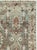 This mid-20th-century Persian Malayer rug presents a distinctive allover geometric-floral pattern across a muted blue-grey...