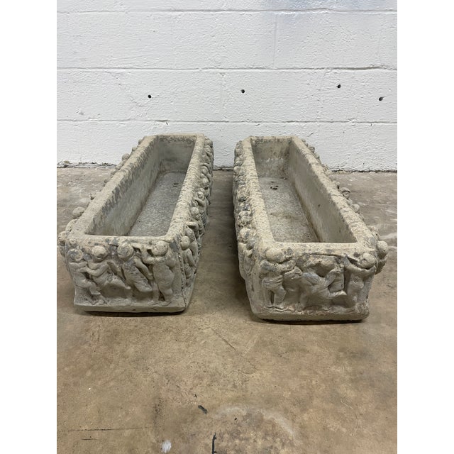 "Straight from the moss-draped gardens of a historic Montogmery AL estate, this pair of monumental cast stone trough...