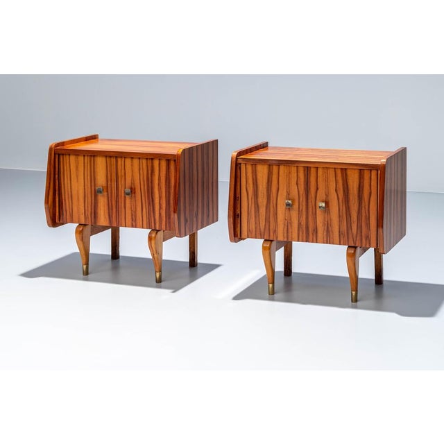 Set of Two Night Stands in Zebra Wood and Brass, 1960's, France This playful pair of night stands combines sharp lines...