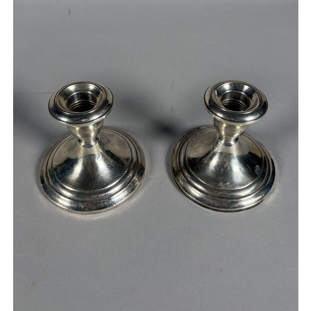 Pair of 925 silver candlesticks - weighted bases. American work, early 20th century, circa 1900. Weight: 702 grams....