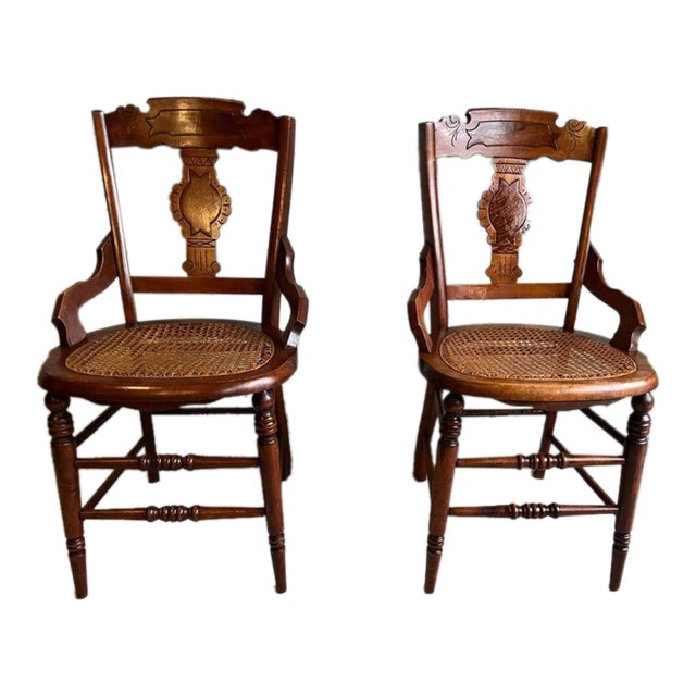 Early 20th Century Pair of Antique Eastlake Walnut Cane Seat Armchairs For Sale