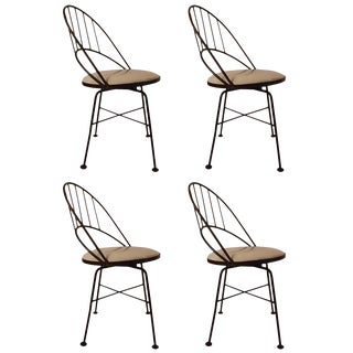 Set of Four Wrought Iron Swivel Chairs For Sale