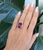 Bold and luxurious, this ring showcases a stunning 15.5ct rubellite tourmaline in an elegant 19 x 13 mm oval cut with...